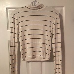 A Black & Cream Striped Turtleneck